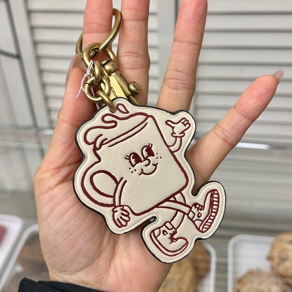 Coach Accessories - Coach’s Lil Miss Jo keychain charm
